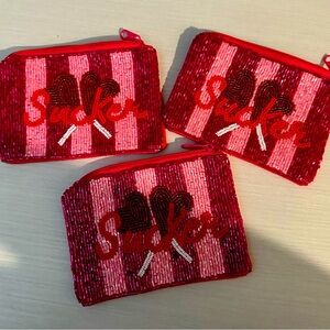 New with tags - beaded coin zipped bag.